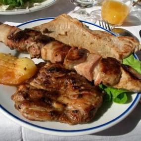 Feast on tasty Serbian meat dinner